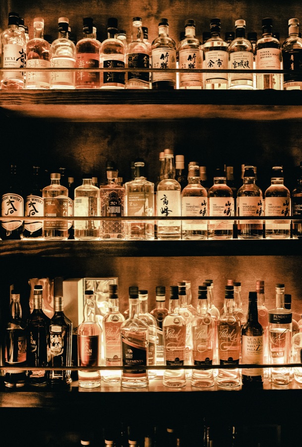 Back bar shelves glowing at night